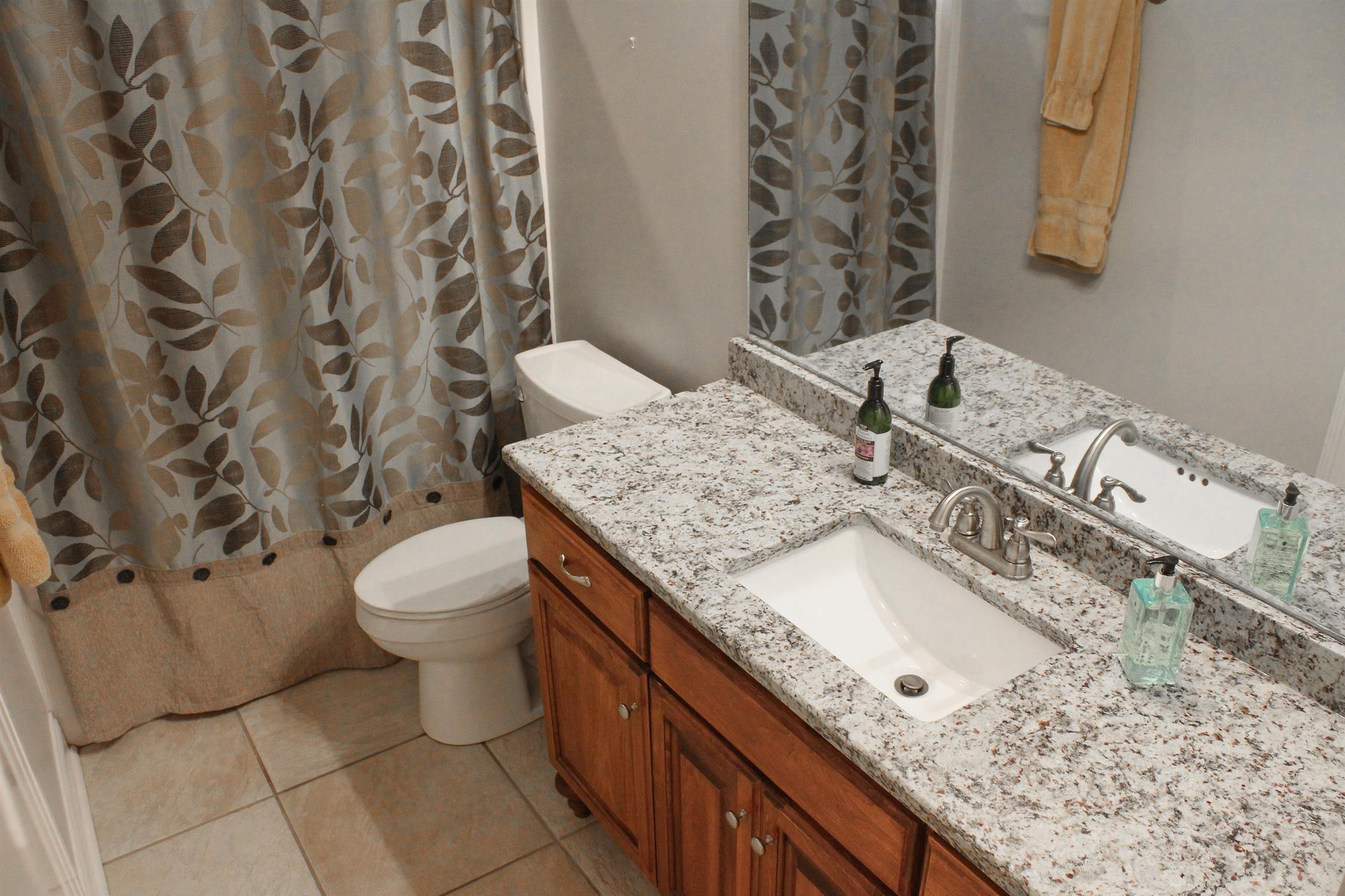 5411 Sherrington Road Murfreesboro, TN 37128 - Photo 21 of 30 2nd downstairs full bathroom open to guest room and hallway
