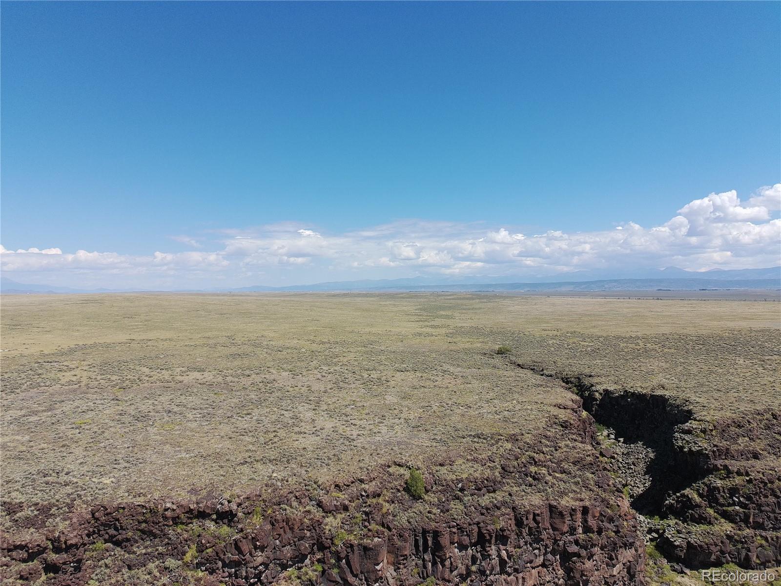 3946 County Rd B San Luis, CO 81152 - Photo 16 of 49 a view of an ocean and mountain