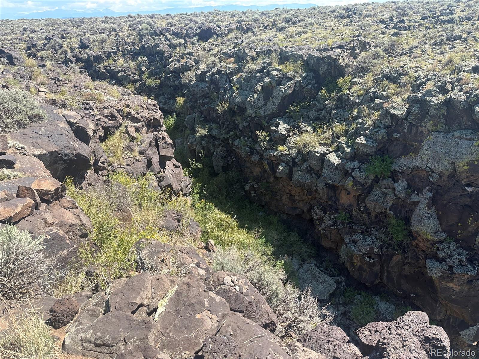3946 County Rd B San Luis, CO 81152 - Photo 20 of 49 a aerial view of a house with a yard