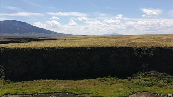 a view of an ocean & beach