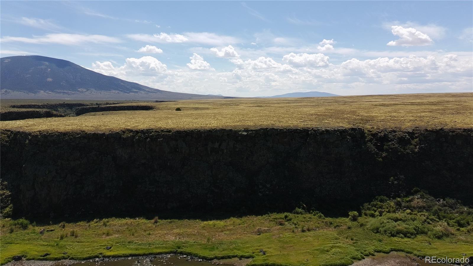 3946 County Rd B San Luis, CO 81152 - Photo 3 of 49 a view of an ocean & beach