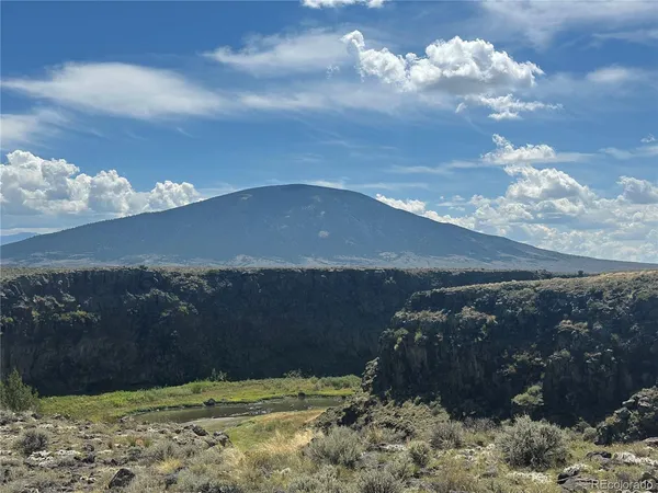 a view of a pathway with a beach