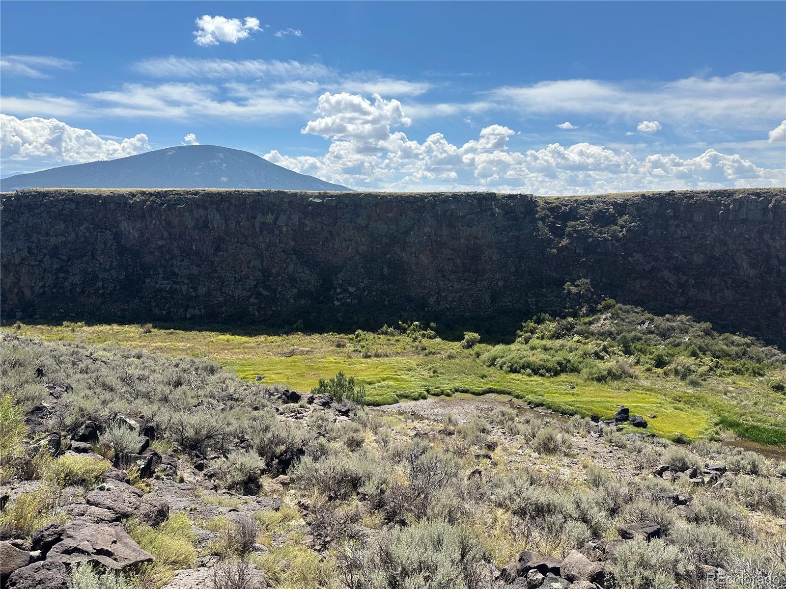 3946 County Rd B San Luis, CO 81152 - Photo 38 of 49 a view of a backyard of the house