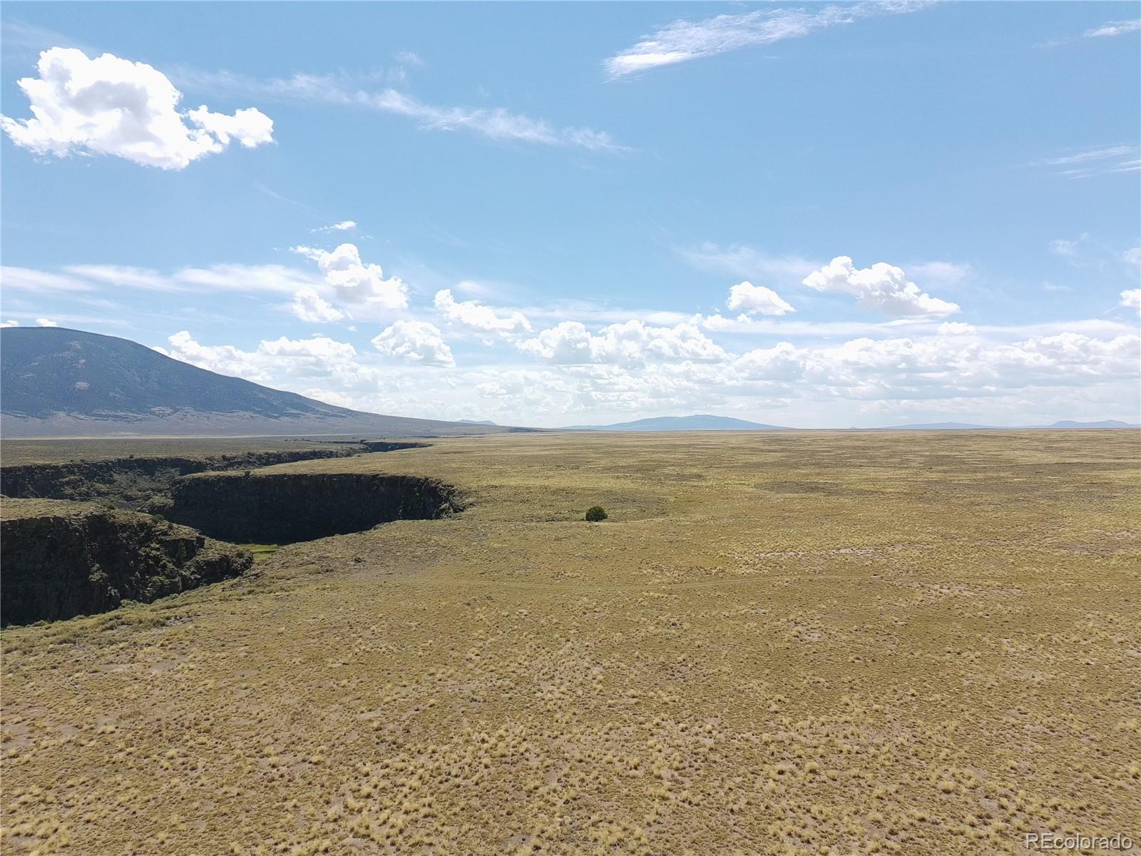 3946 County Rd B San Luis, CO 81152 - Photo 5 of 49 a view of an ocean and beach
