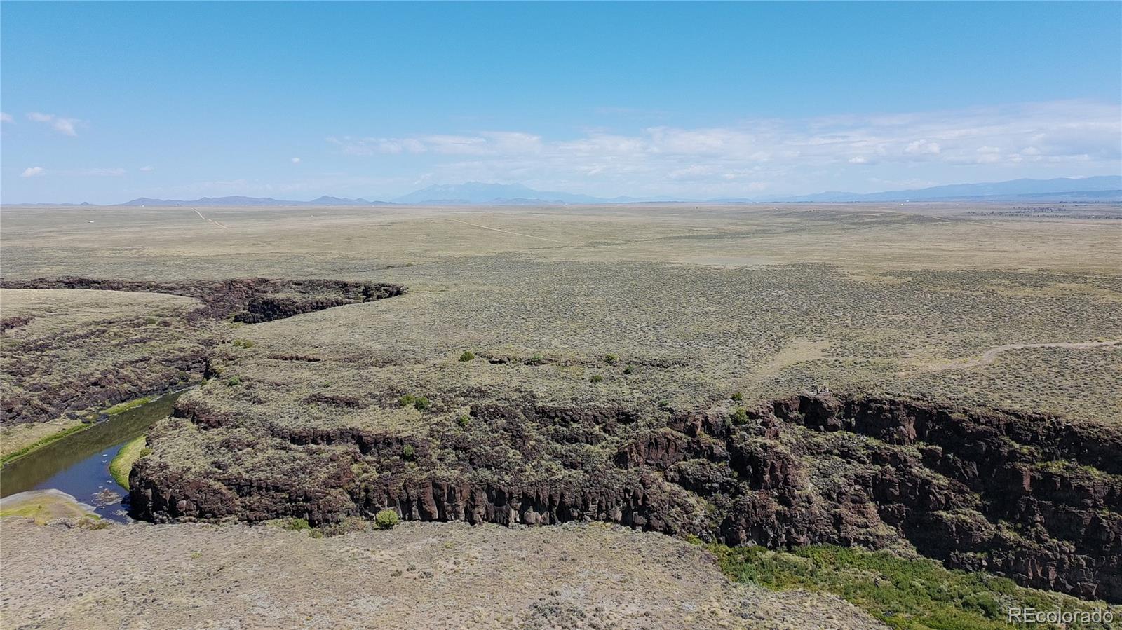 3946 County Rd B San Luis, CO 81152 - Photo 7 of 49 a view of an ocean beach