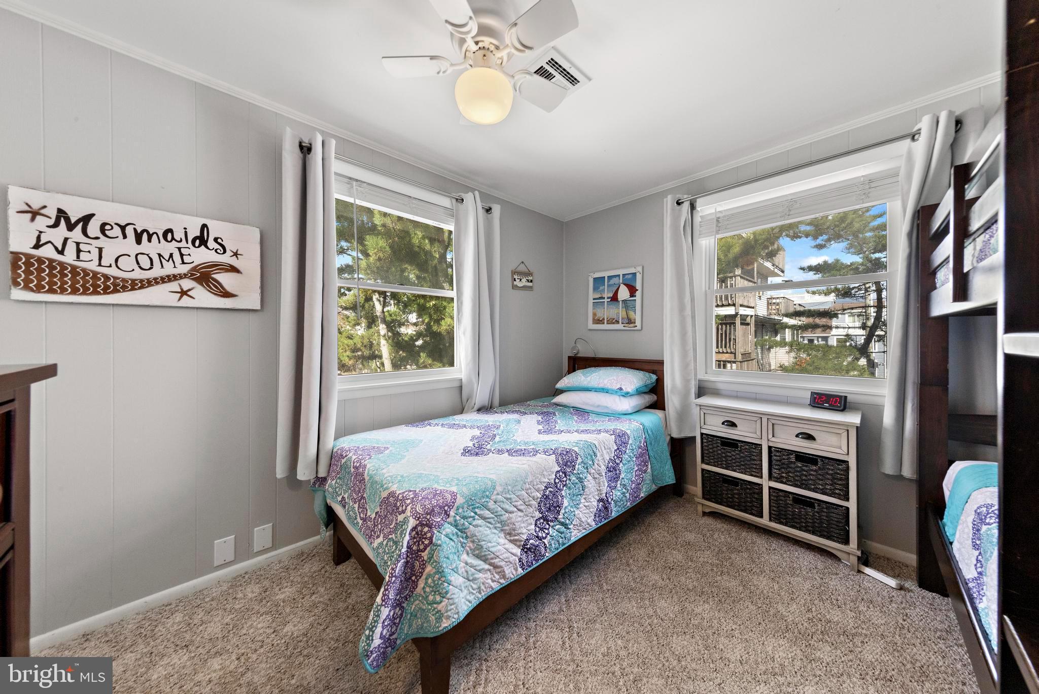 13 Joan Road, Unit 2 Long Beach Township, NJ 08008 - Photo 20 of 64 a bedroom with a bed and a window