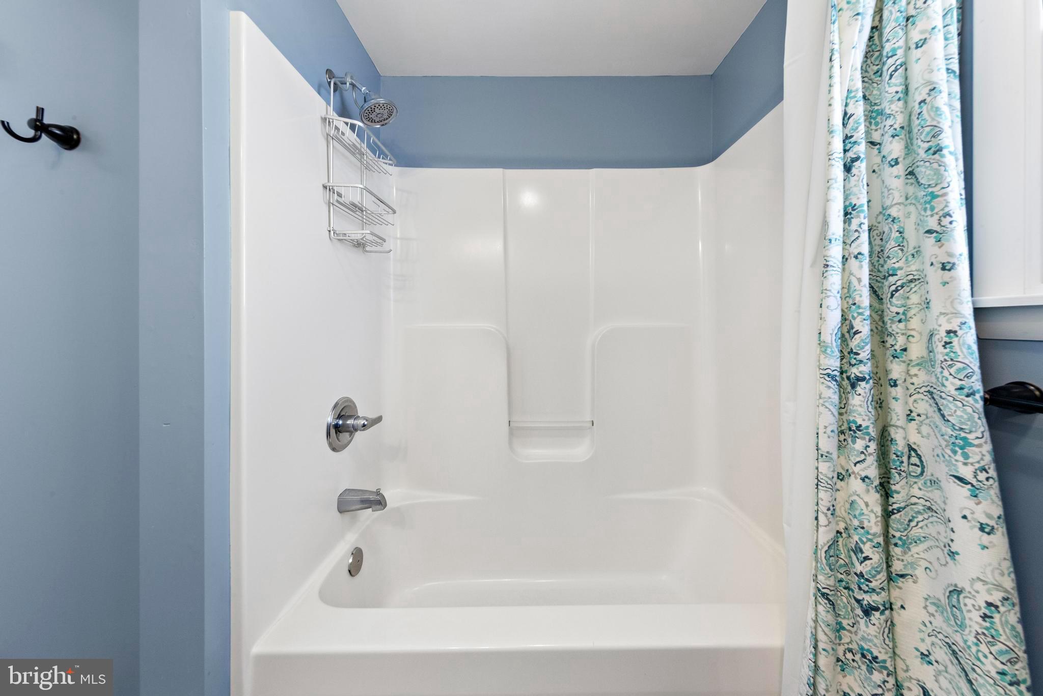 13 Joan Road, Unit 2 Long Beach Township, NJ 08008 - Photo 26 of 64 a bathroom with a bathtub and shower