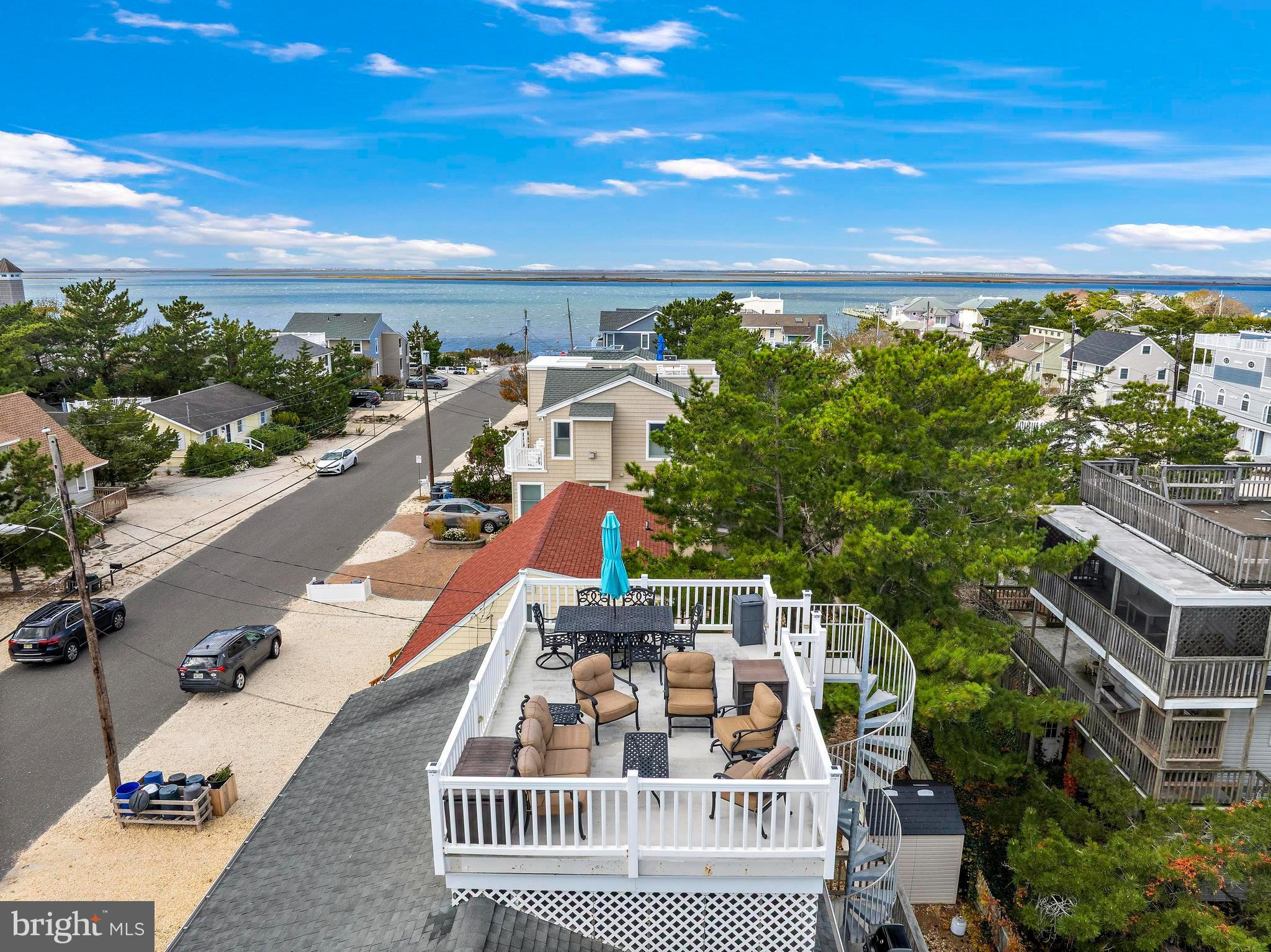 13 Joan Road, Unit 2 Long Beach Township, NJ 08008 - Photo 27 of 64 a view of balcony with furniture