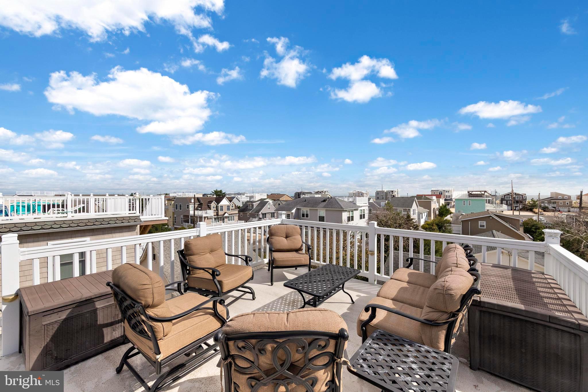 13 Joan Road, Unit 2 Long Beach Township, NJ 08008 - Photo 32 of 64 a view of a terrace with furniture