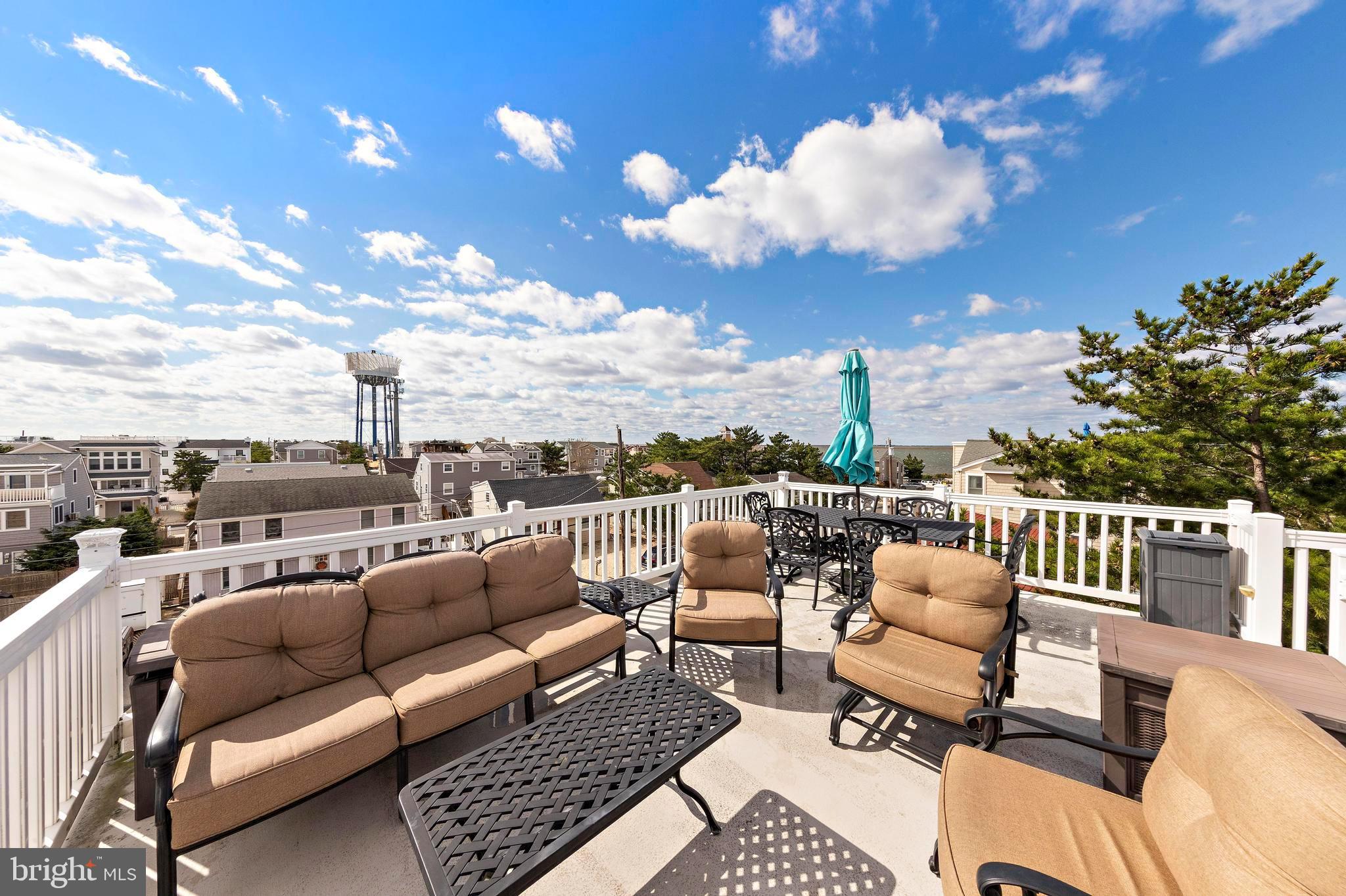 13 Joan Road, Unit 2 Long Beach Township, NJ 08008 - Photo 34 of 64 a terrace view with seating space and seating