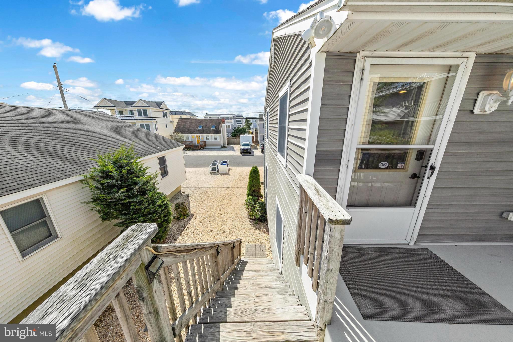 13 Joan Road, Unit 2 Long Beach Township, NJ 08008 - Photo 49 of 64 a view of balcony with furniture