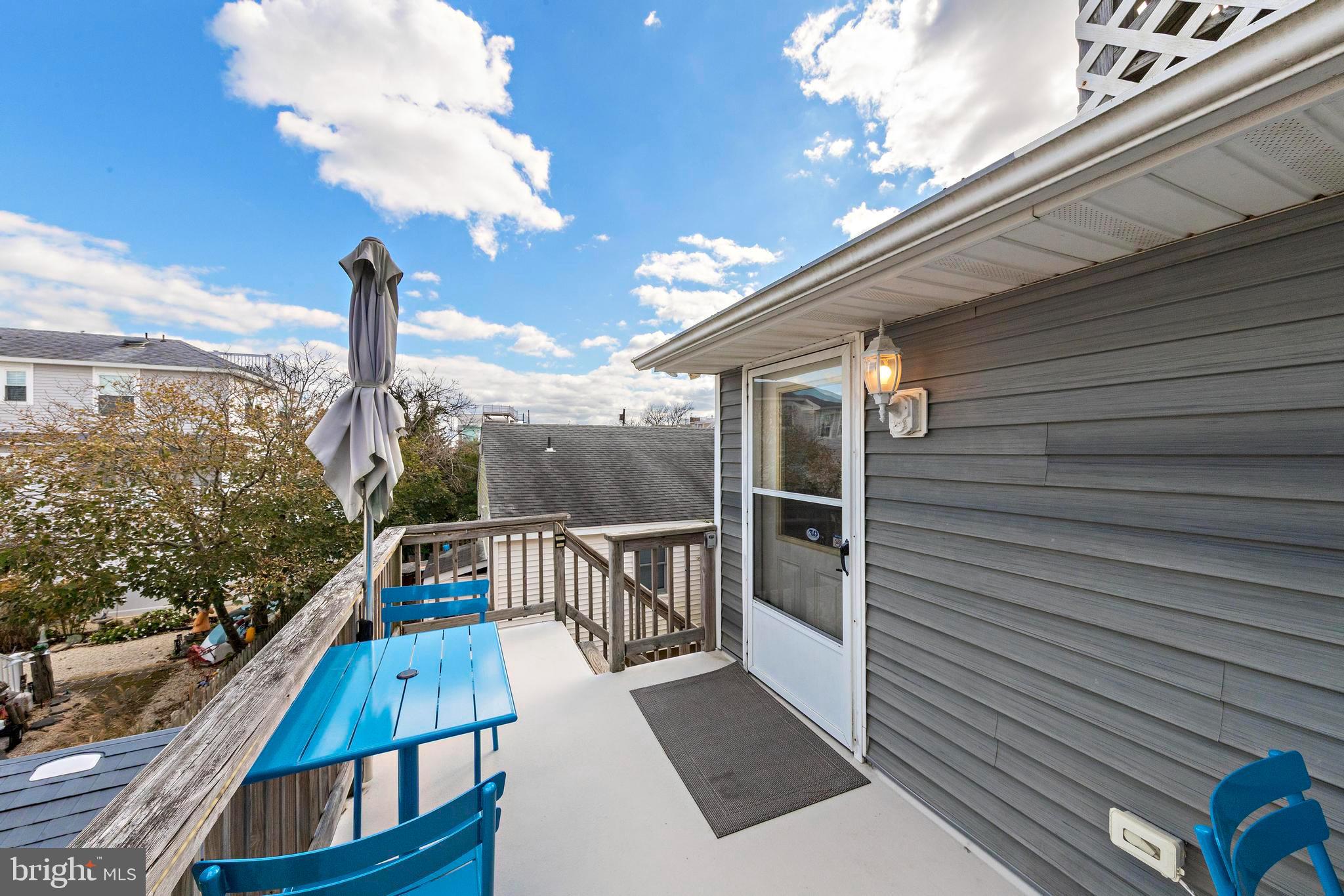13 Joan Road, Unit 2 Long Beach Township, NJ 08008 - Photo 50 of 64 a view of balcony with furniture