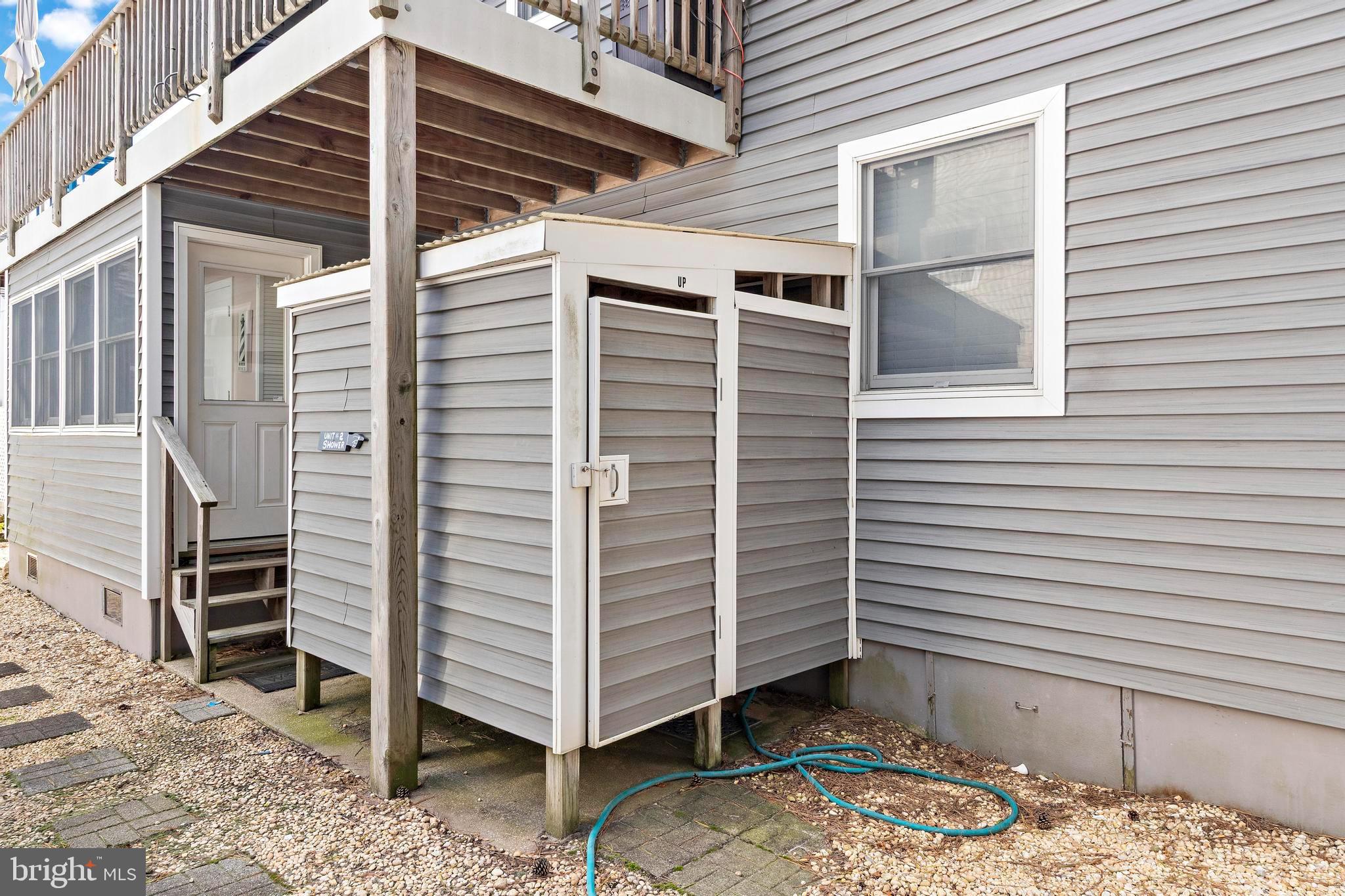 13 Joan Road, Unit 2 Long Beach Township, NJ 08008 - Photo 53 of 64 a view of a house with a yard