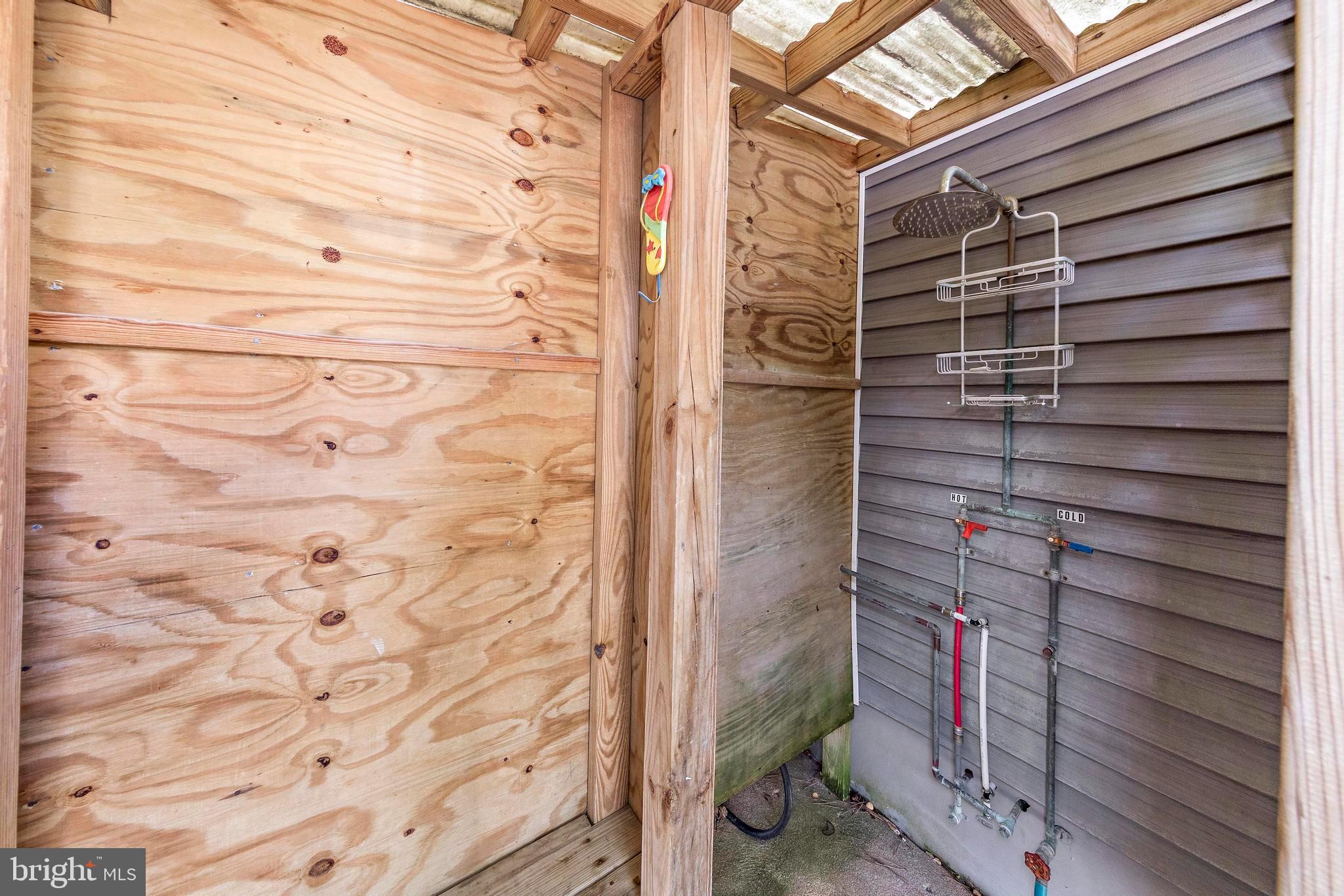 13 Joan Road, Unit 2 Long Beach Township, NJ 08008 - Photo 54 of 64 a bathroom with a shower and a sink