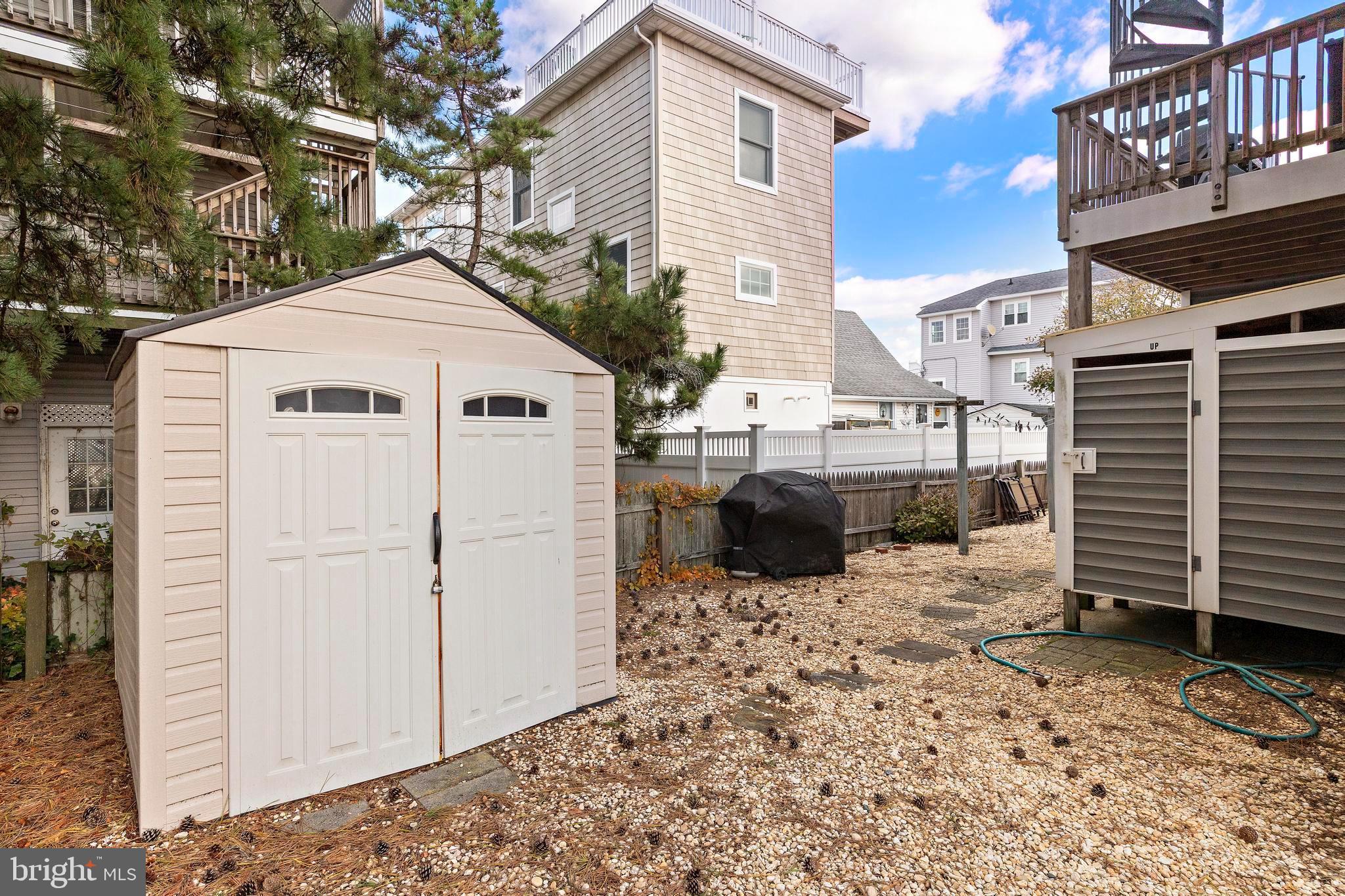 13 Joan Road, Unit 2 Long Beach Township, NJ 08008 - Photo 55 of 64 a view of a back yard of the house