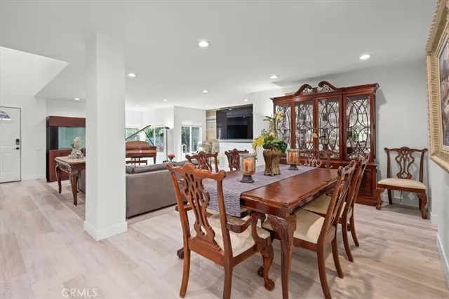 a view of a dining room with furniture and a livingroom