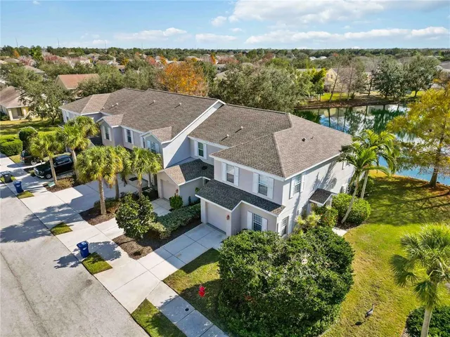 an aerial view of a house with a garden