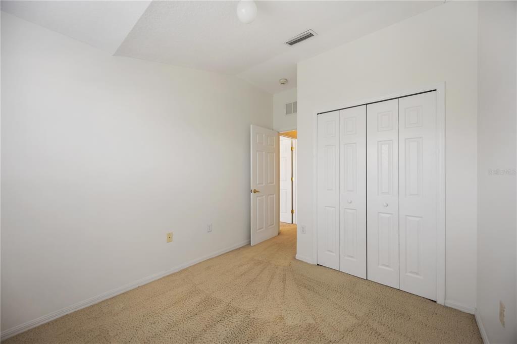 14980 Skip Jack Loop Lakewood Ranch, FL 34202 - Photo 25 of 39 a view of a room with an empty space