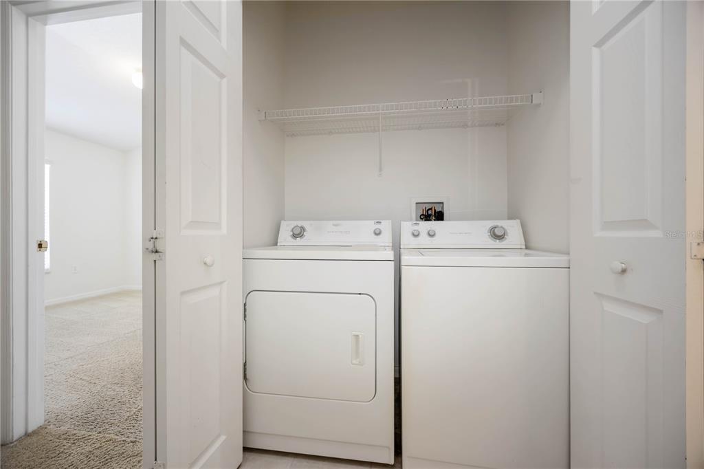 14980 Skip Jack Loop Lakewood Ranch, FL 34202 - Photo 26 of 39 a utility room with dryer and washer