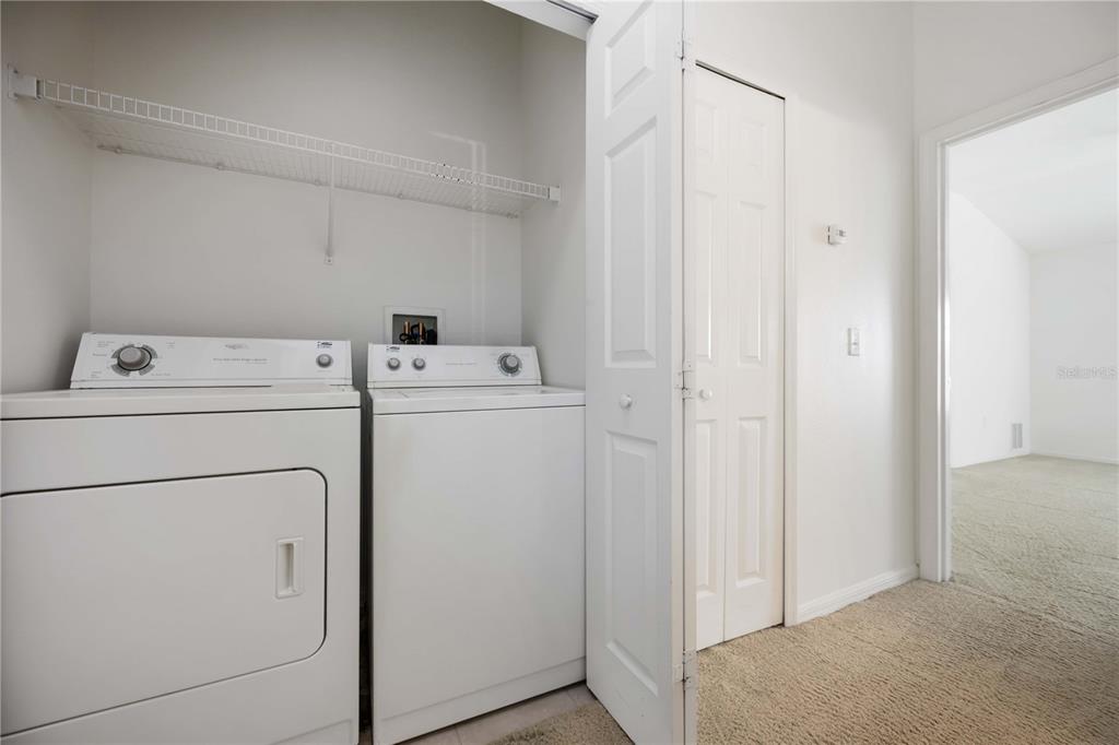 14980 Skip Jack Loop Lakewood Ranch, FL 34202 - Photo 27 of 39 a utility room with dryer and washer