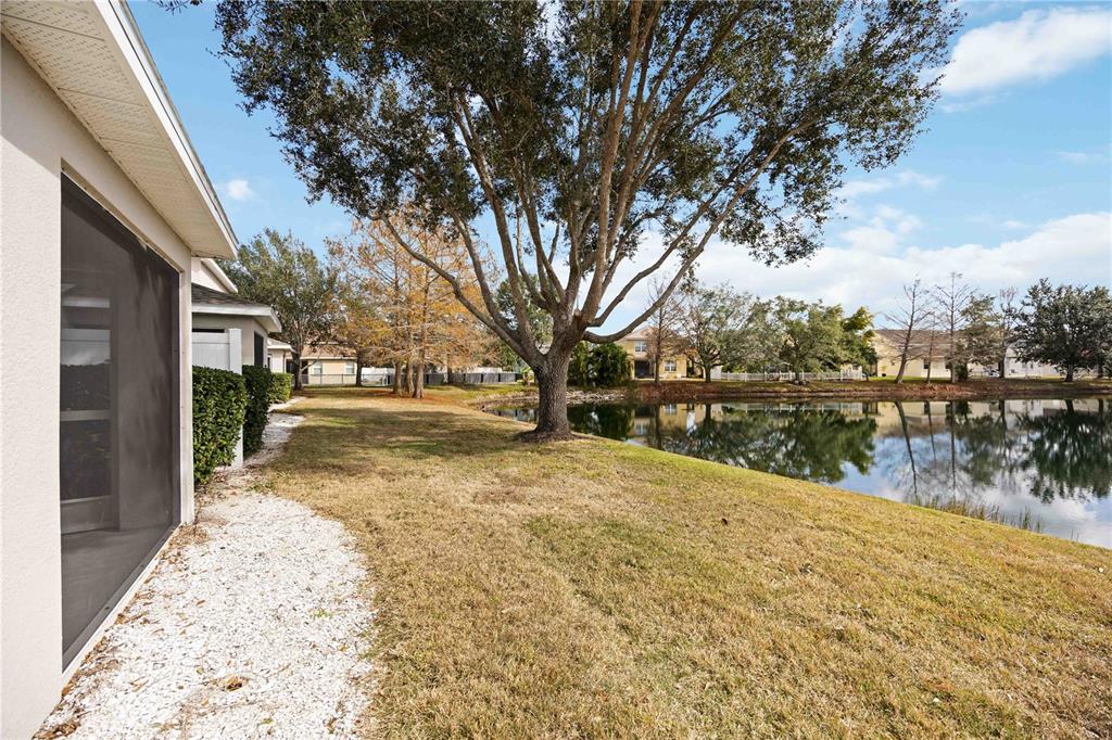 14980 Skip Jack Loop Lakewood Ranch, FL 34202 - Photo 32 of 39 a view of lake with a trees