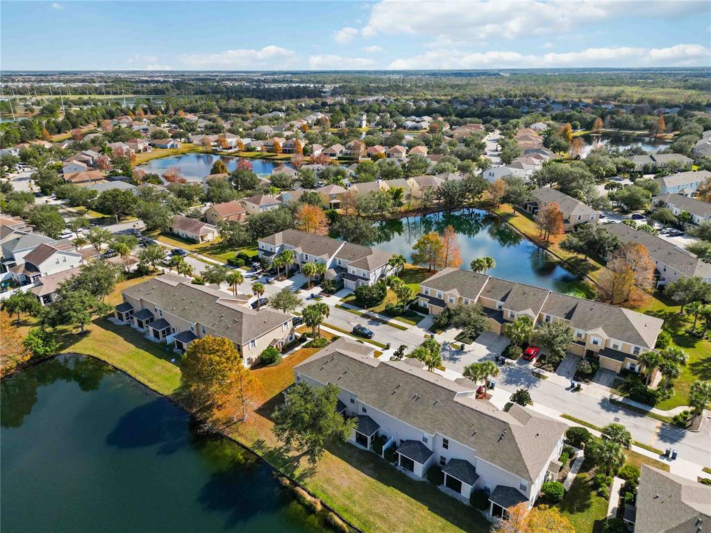 14980 Skip Jack Loop Lakewood Ranch, FL 34202 - Photo 35 of 39 an aerial view of residential houses with outdoor space
