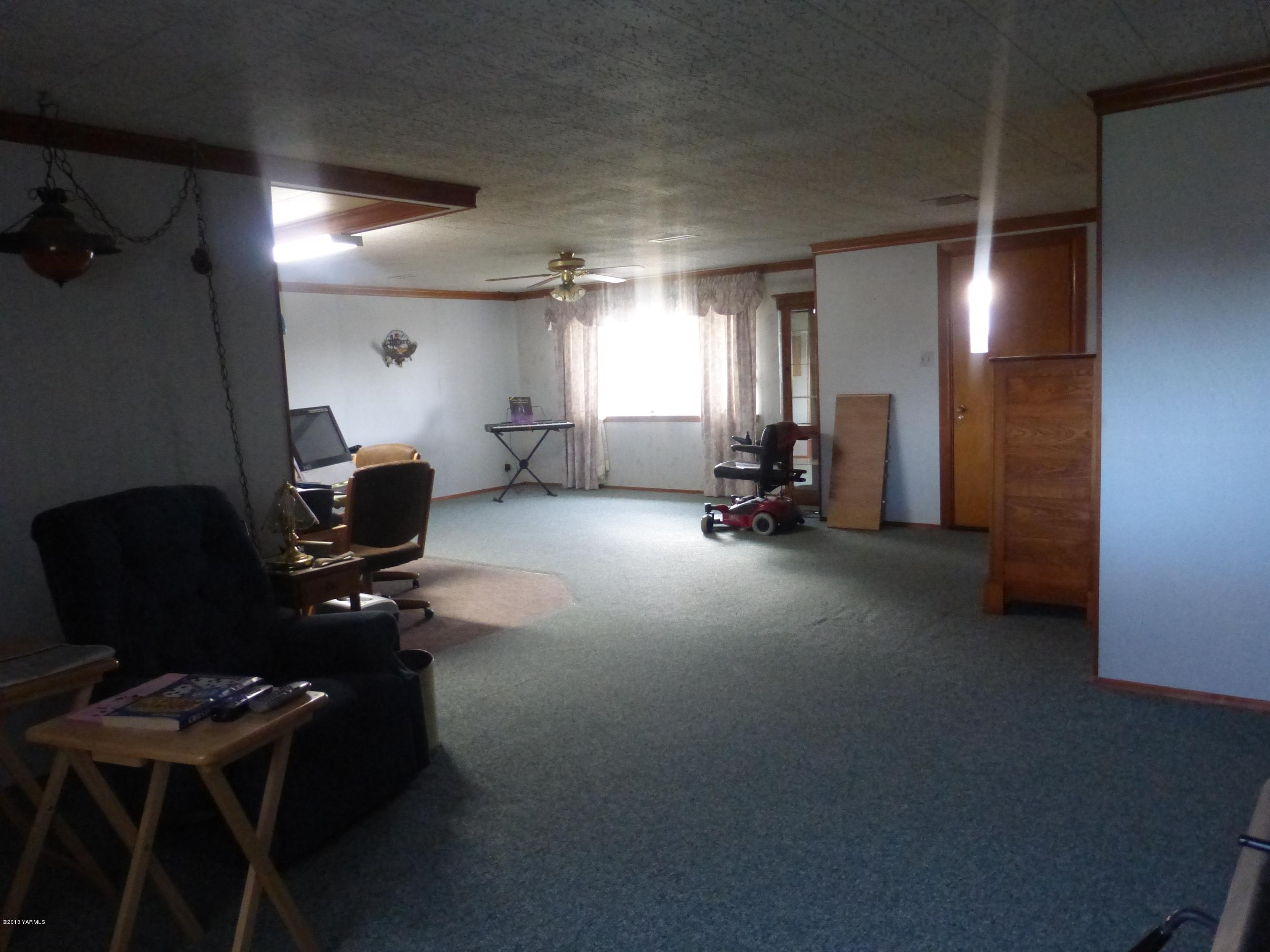 461 Barker Road Granger, WA 98932 - Photo 21 of 37 a view of a room with gym equipment