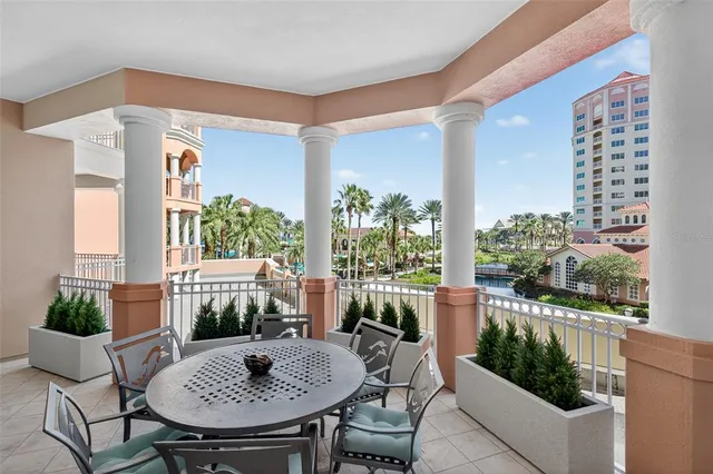 a bedroom with two beds and a couch