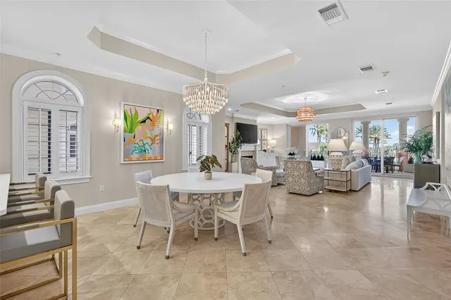 a spacious bedroom with a bed and a walk in closet