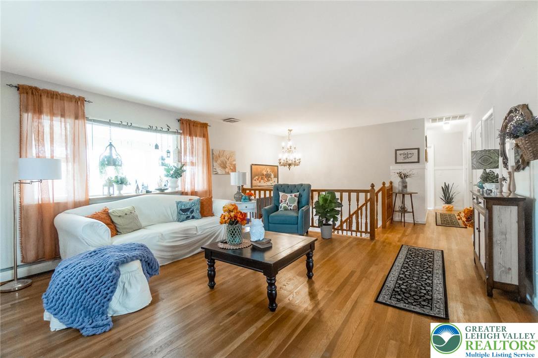 3218 Highland Road Orefield, PA 18069 - Photo 11 of 53 a living room with furniture and wooden floor