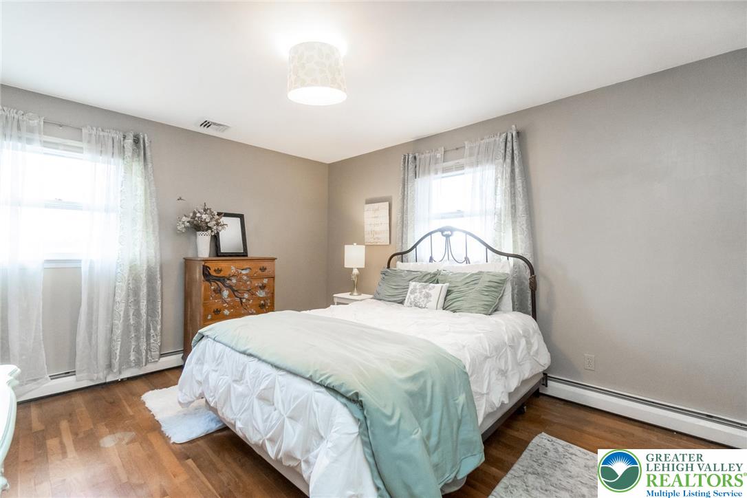 3218 Highland Road Orefield, PA 18069 - Photo 21 of 53 a bedroom with a bed and a window