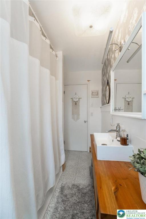 3218 Highland Road Orefield, PA 18069 - Photo 24 of 53 a bathroom with a sink and a mirror