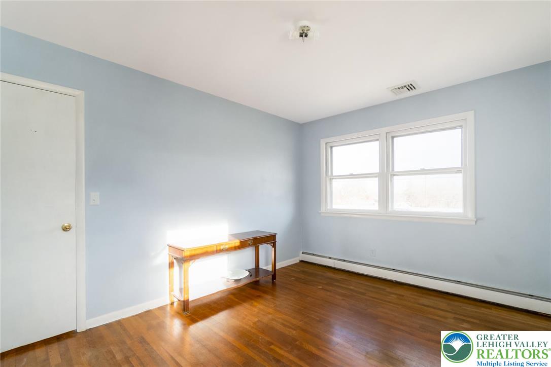 3218 Highland Road Orefield, PA 18069 - Photo 29 of 53 a room with window and wooden floor