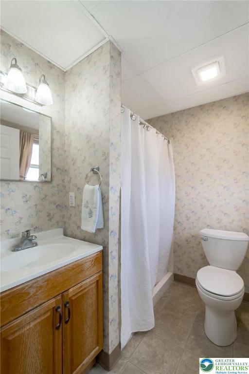 3218 Highland Road Orefield, PA 18069 - Photo 42 of 53 a bathroom with a toilet sink and mirror