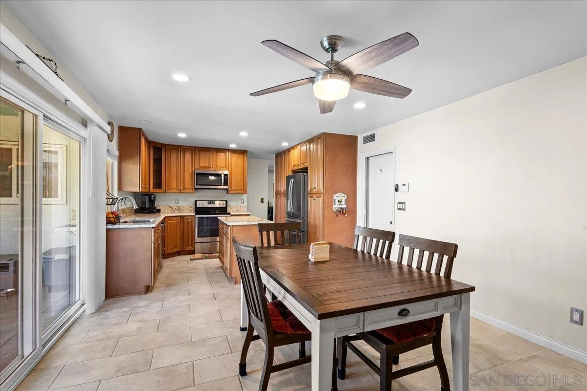 10738 2nd Street Santee, CA 92071 - Photo 13 of 52 a view of a dining room with furniture