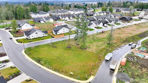 a view of a swimming pool with a lake view