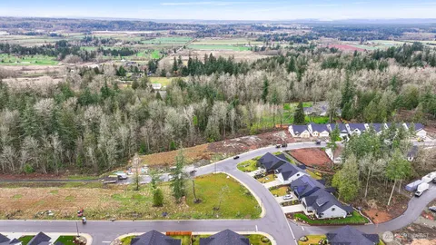 an aerial view of residential house with outdoor space