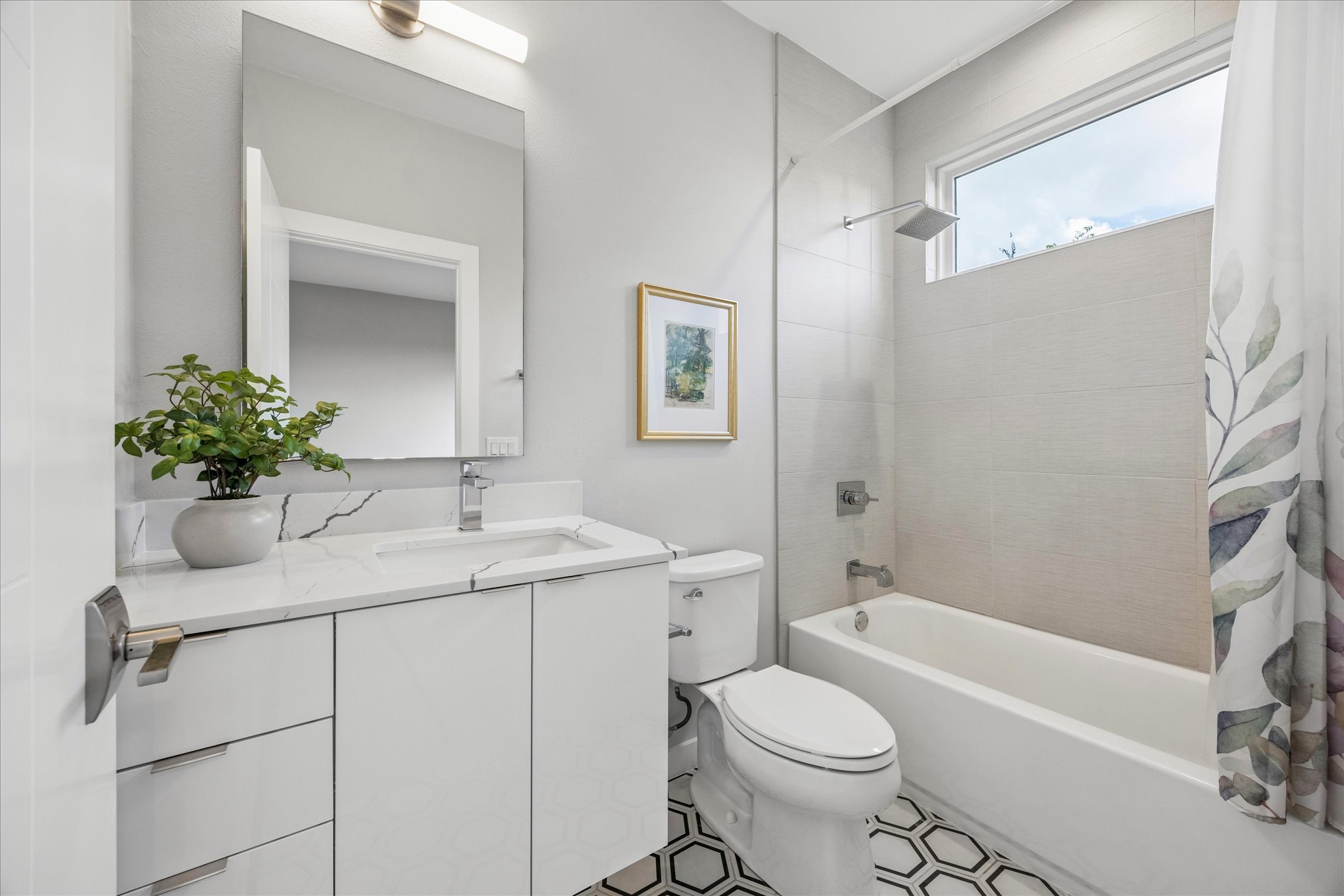 2108 Tillery Street, Unit 9 Austin, TX 78723 - Photo 19 of 25 Secondary bedroom en-suite bathroom.