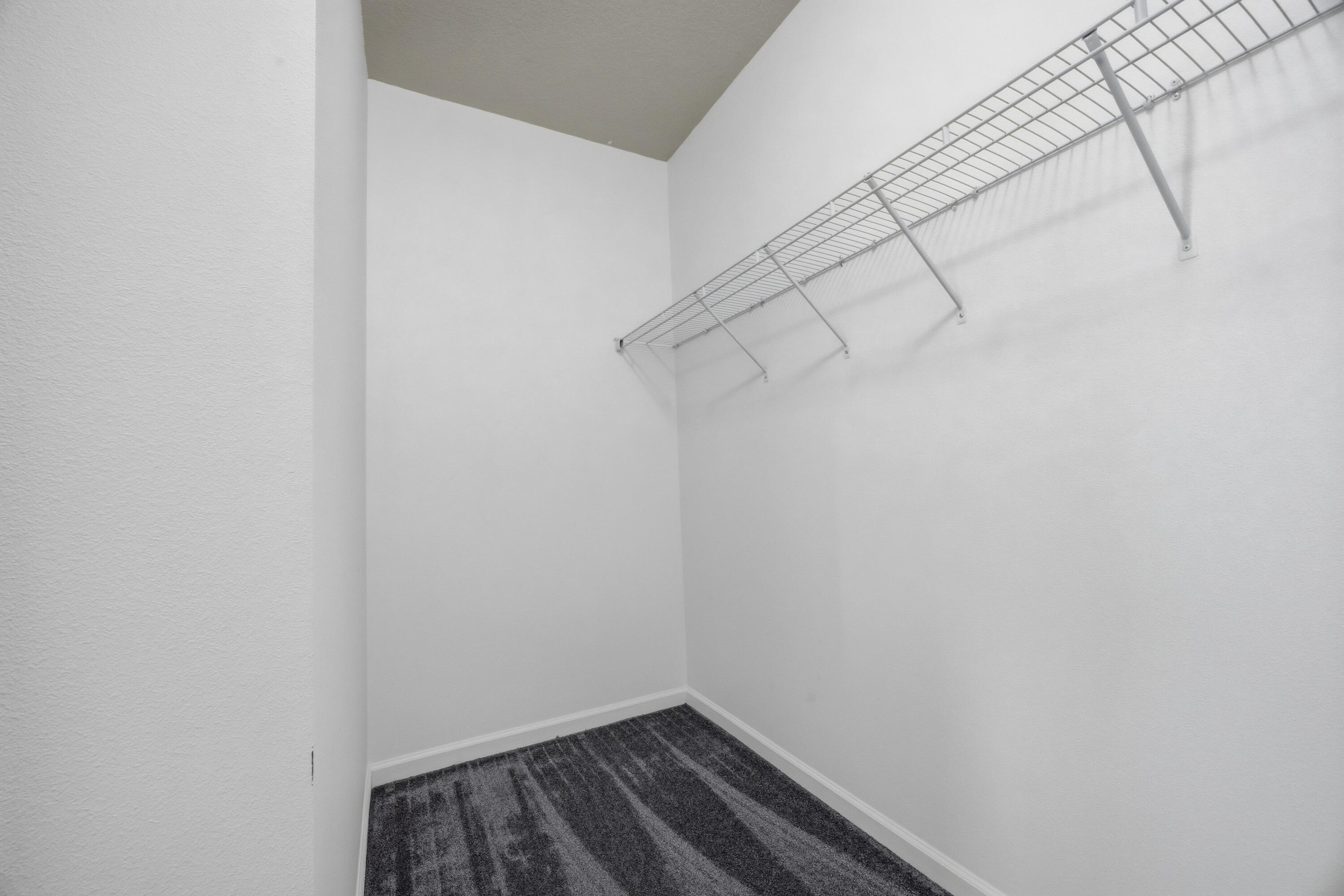 102 Cornelia Street Freeport, FL 32439 - Photo 14 of 39 a view of a room with racks on the wall
