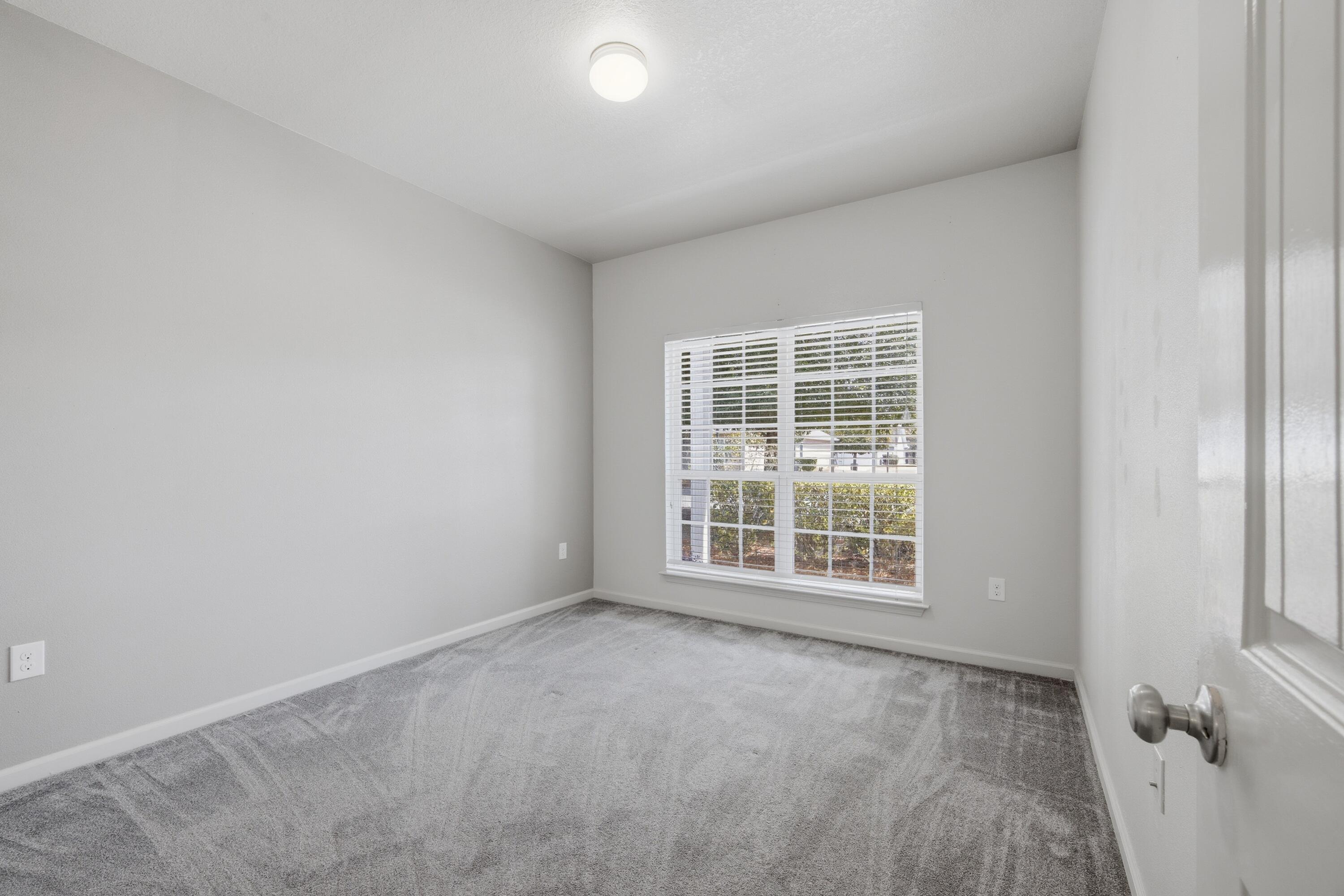 102 Cornelia Street Freeport, FL 32439 - Photo 22 of 39 an empty room with a window