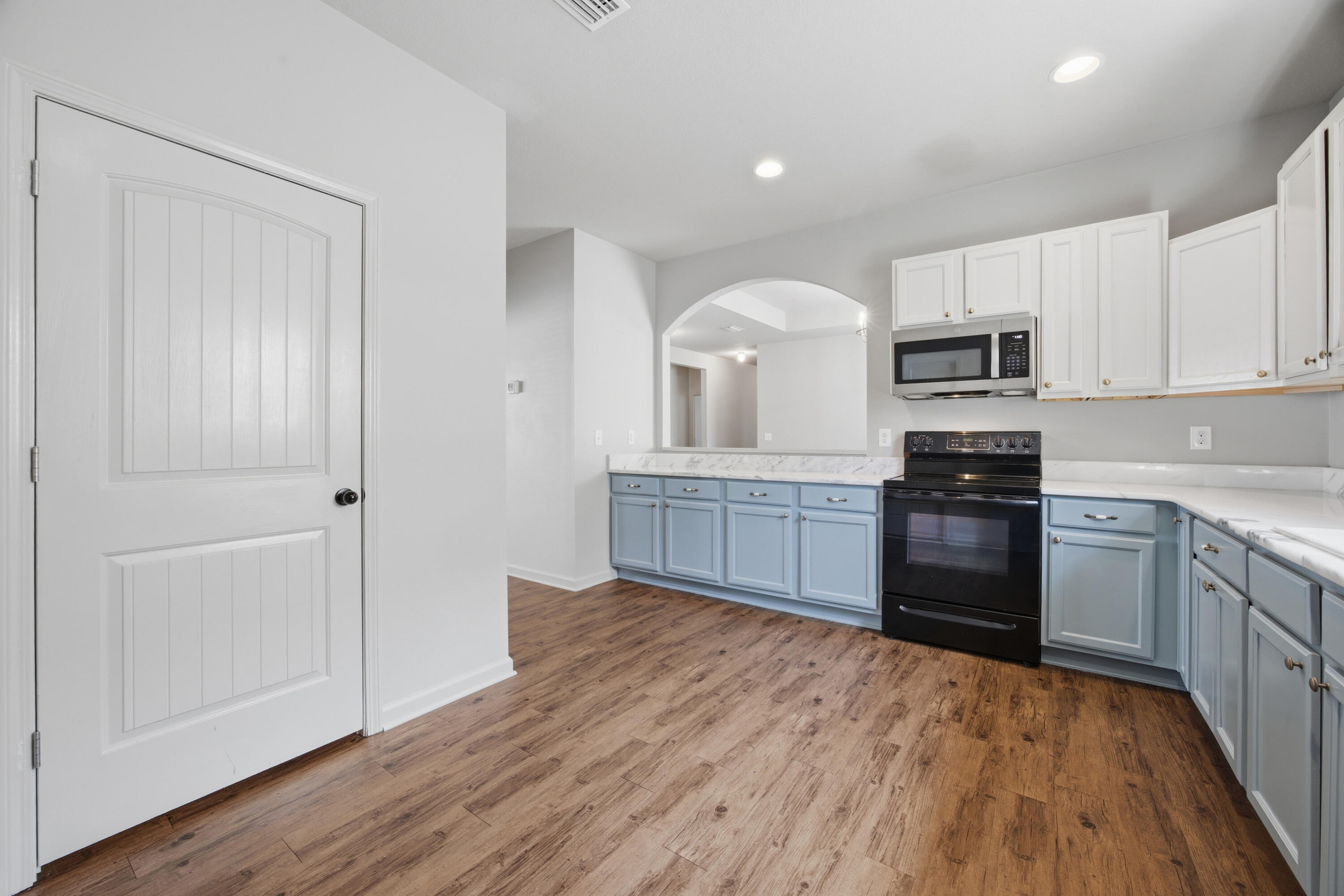 102 Cornelia Street Freeport, FL 32439 - Photo 33 of 39 a kitchen with granite countertop a sink cabinets and stainless steel appliances