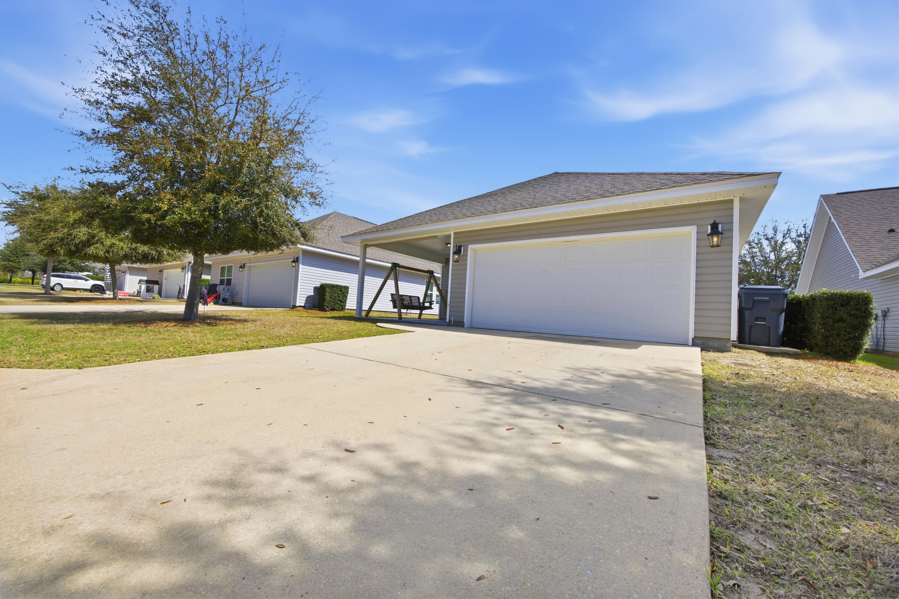 102 Cornelia Street Freeport, FL 32439 - Photo 39 of 39 a house with trees in front of it
