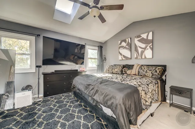 a bedroom with a bed and closet