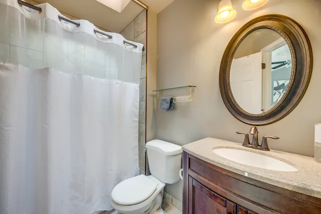 a bathroom with a toilet a sink and a bathtub
