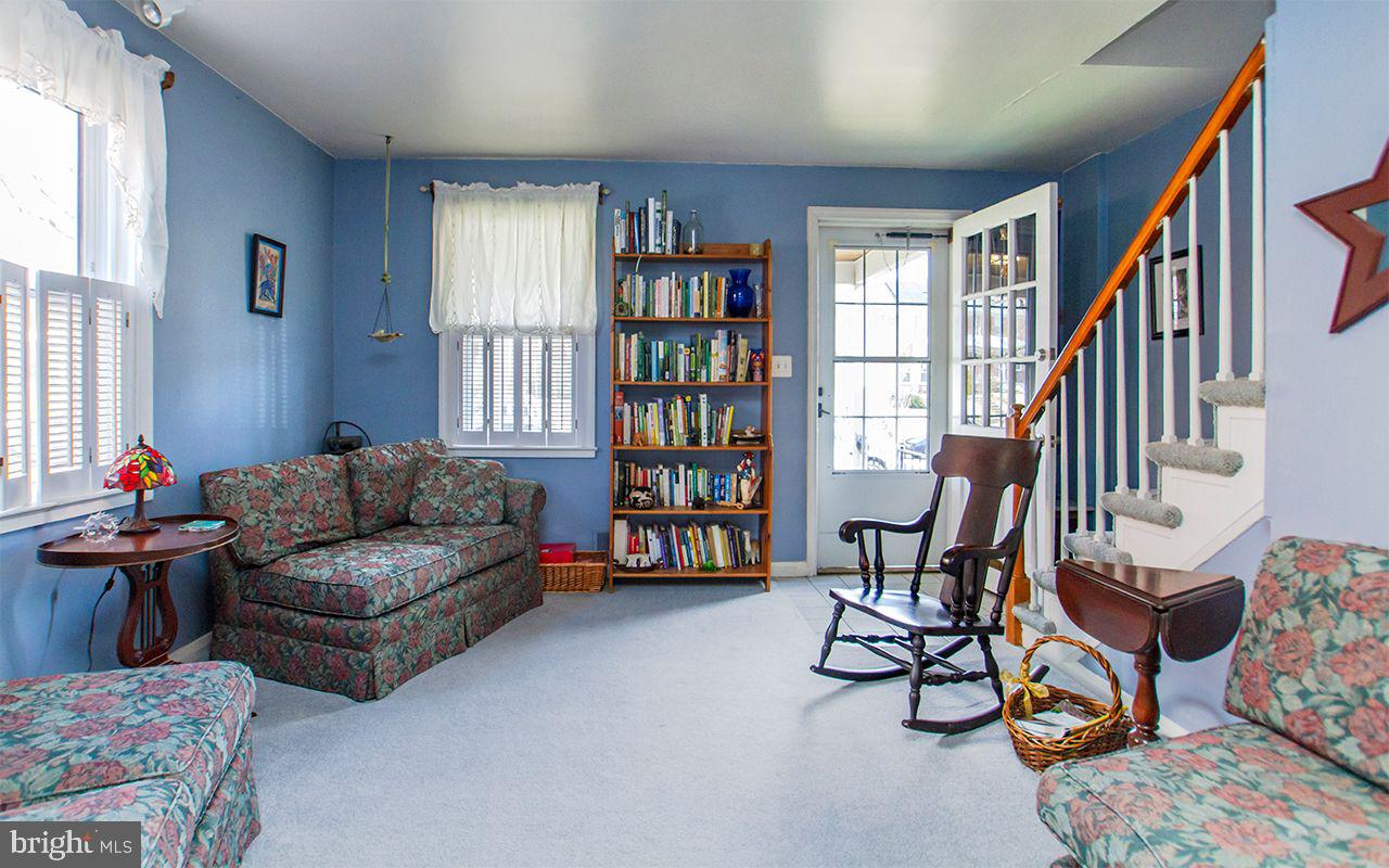 8324 Ridgely Oak Road Parkville, MD 21234 - Photo 11 of 36 Living Room with Front Deck Access