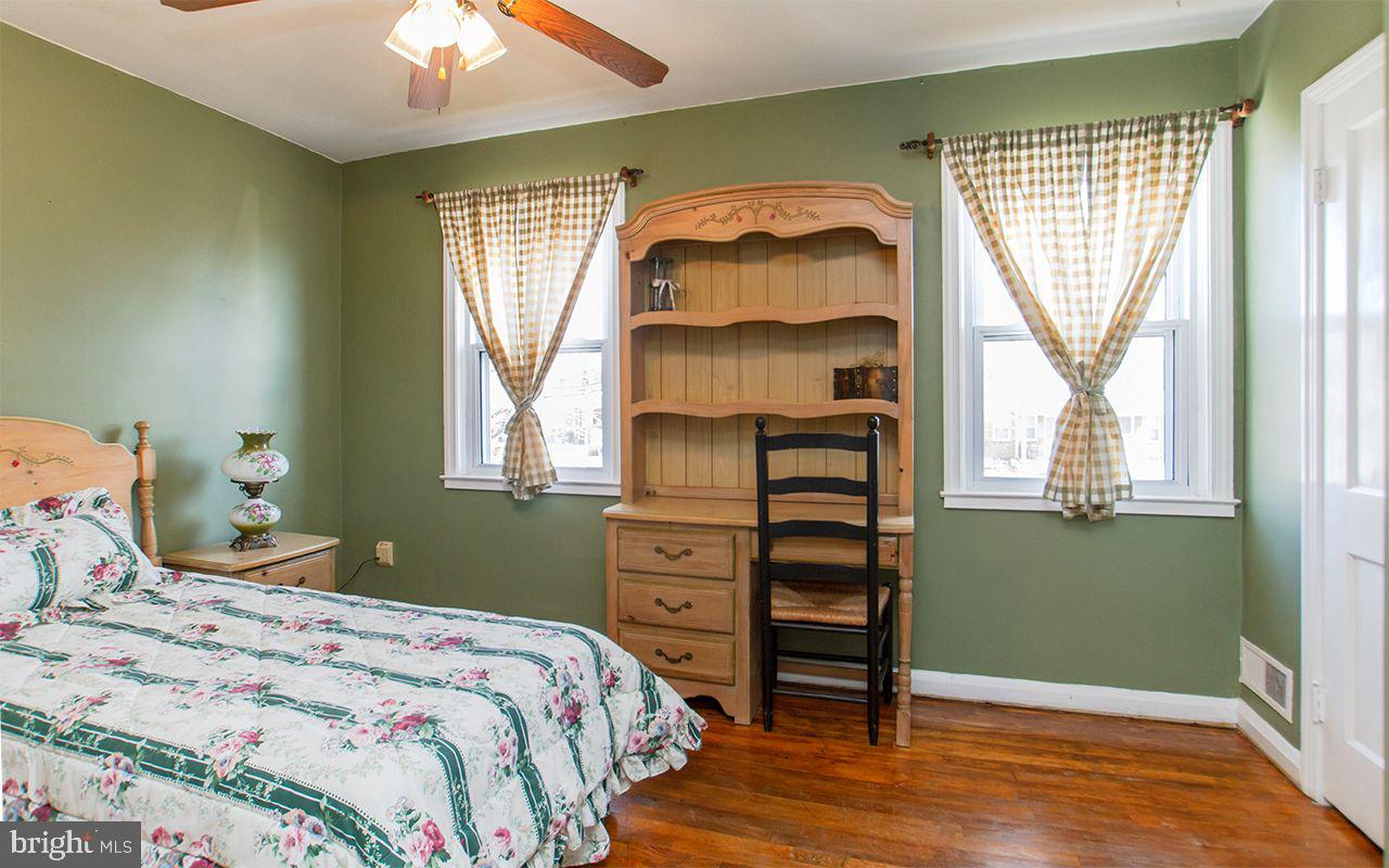 8324 Ridgely Oak Road Parkville, MD 21234 - Photo 15 of 36 Primary Bedroom with Gleaming Hardwood Floors