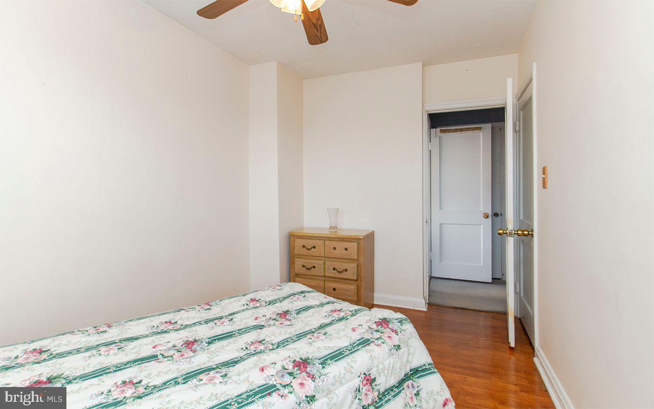 8324 Ridgely Oak Road Parkville, MD 21234 - Photo 22 of 36 2nd Bedroom w Ceiling Fan and Hardwood Floors