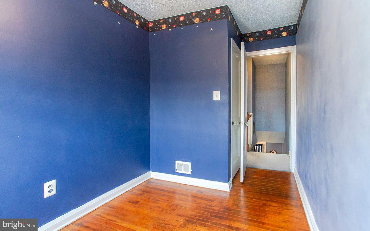 8324 Ridgely Oak Road Parkville, MD 21234 - Photo 24 of 36 3rd Bedroom w Hardwood Floors