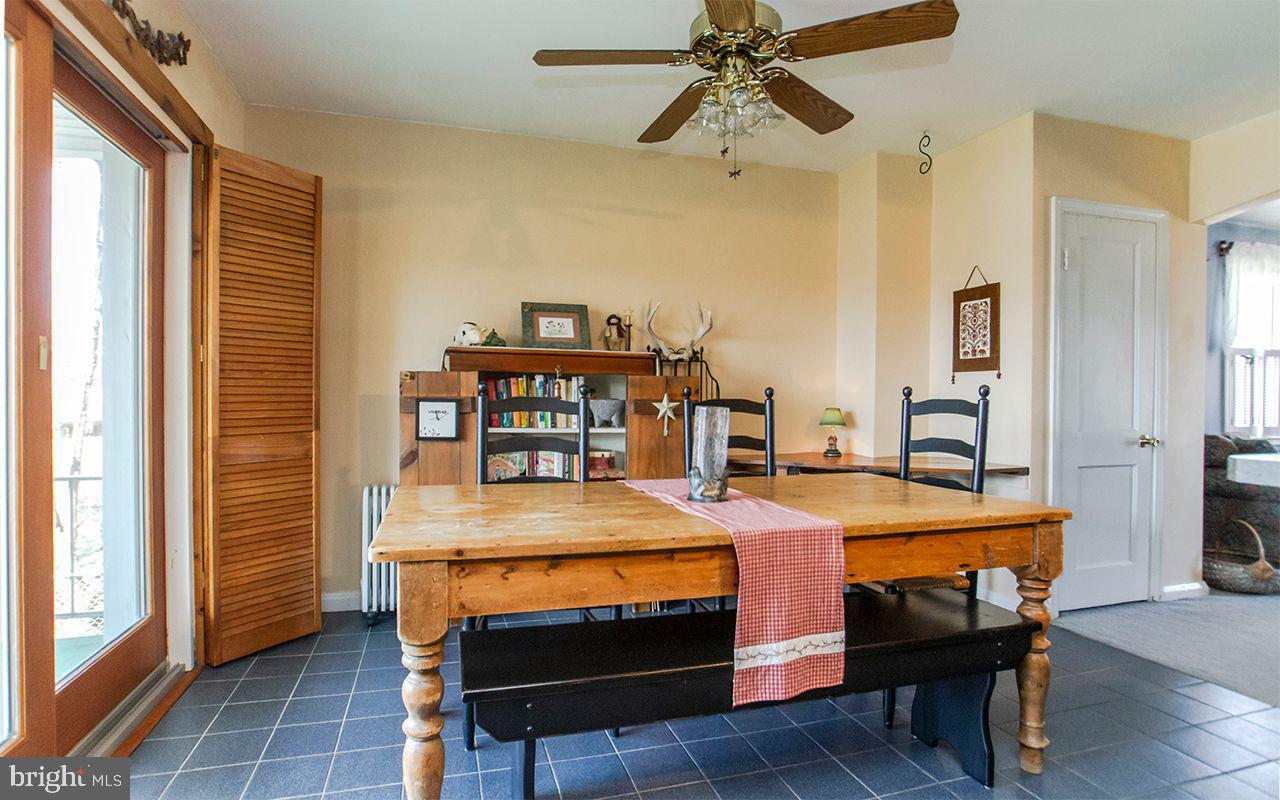 8324 Ridgely Oak Road Parkville, MD 21234 - Photo 3 of 36 Tile Flooring and Ceiling Fan