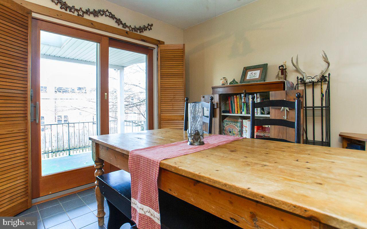 8324 Ridgely Oak Road Parkville, MD 21234 - Photo 4 of 36 Glass Sliders Allow Natural Light to Enter